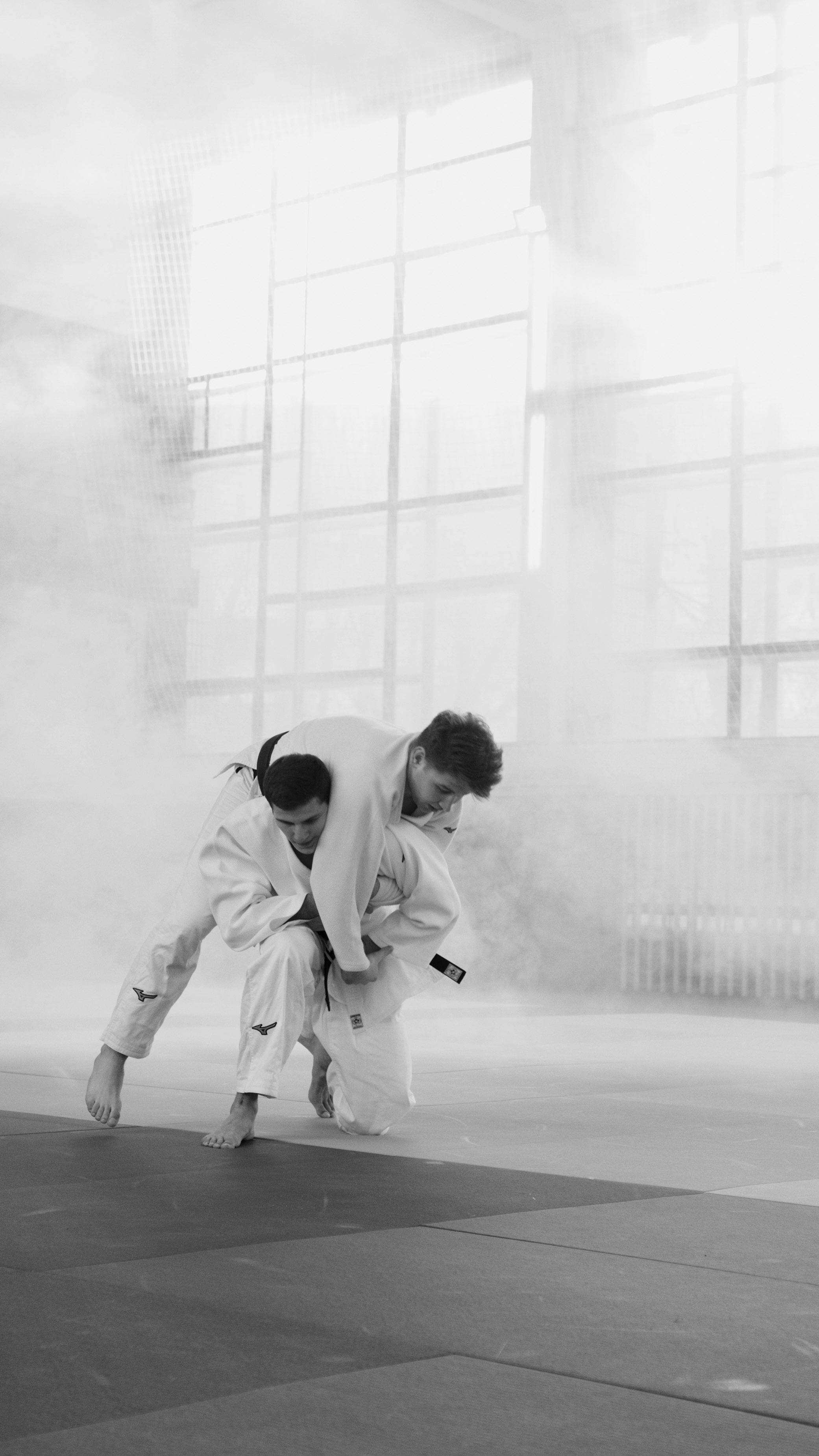 Grapplers training on the mat